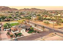 An aerial shot displays this well-kept home in a quiet neighborhood at 4304 W Calle Poco --, Laveen, AZ 85339