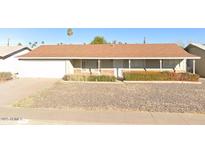 Charming single-story home with a well-kept front yard and an attached one car garage at 548 W Linda Ln, Chandler, AZ 85225