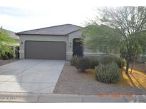 Charming single-story home with a two-car garage, neutral paint, and low-maintenance landscaping at 24646 N Barley Rd, Florence, AZ 85132