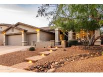Beautiful, well-maintained single-story home with a three-car garage and desert landscaping at 4422 E Spur Dr, Cave Creek, AZ 85331