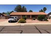Well-maintained single story home with desert landscaping and multi-car driveway at 1156 E Vinedo Ln, Tempe, AZ 85284