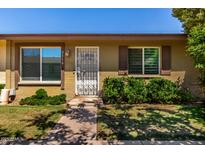 Inviting single story home featuring a secure front door and well-maintained landscaping at 2514 N 22Nd Ave, Phoenix, AZ 85009