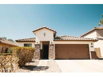 Charming single-story home features a neutral color scheme and well-maintained front yard and desert landscaping at 3756 E Alamo St, San Tan Valley, AZ 85140