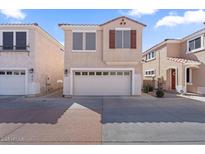 Attractive two-story home featuring a two-car garage and a well-maintained exterior at 421 W Mountain Sage Dr, Phoenix, AZ 85045