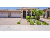 Charming single-story home with a well-manicured front yard and inviting entrance at 17219 W La Luz Rd, Surprise, AZ 85387