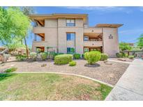 Charming condo building with manicured landscaping and private balconies in a desirable community at 20100 N 78Th Pl # 3103, Scottsdale, AZ 85255