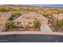 Beautiful single-story home with well manicured desert landscaping and three-car garage at 31705 N 128Th Dr, Peoria, AZ 85383