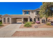 Charming home with a spacious covered carport, desert landscaping and beautiful curb appeal at 17853 W Pershing St, Surprise, AZ 85388