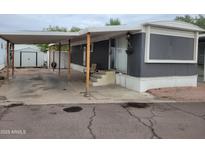 Charming home exterior with covered parking and cozy front porch with a 