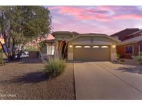 Charming single-story home with desert landscaping and a two-car garage at 3373 W Five Mile Peak Dr, San Tan Valley, AZ 85144