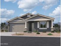 Beautiful single story home featuring neutral color palette, two car garage, and low maintenance desert landscaping at 7596 W Saddlehorn Rd, Peoria, AZ 85383