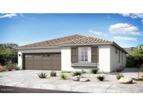 Charming single-story home with a tile roof, neutral stucco and landscaped front yard at 14381 W Calle Lejos --, Surprise, AZ 85387