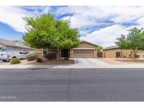 Charming single-Gathering home with a desert landscape and a spacious two car driveway at 4216 W Harwell Rd, Laveen, AZ 85339