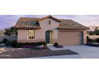 Charming single-story home featuring a welcoming entrance, a two-car garage, and stylish desert landscaping at 2953 E Mecklenburg Way, San Tan Valley, AZ 85143