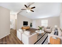 Bright living room featuring modern furniture, vaulted ceiling, and contemporary decor at 320 E Mckellips Rd # 163, Mesa, AZ 85201