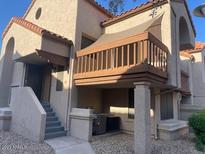 Charming two-story home with a balcony and an open porch area at 818 S Westwood -- # 233, Mesa, AZ 85210