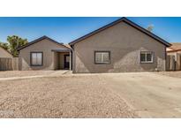 Charming single-story home with low maintenance desert landscaping and newer roof at 7506 W Sells Dr, Phoenix, AZ 85033