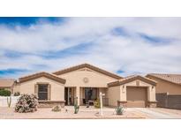 Beautiful single-story home with a desert landscape and a welcoming front porch at 2101 S Meridian Rd # 176, Apache Junction, AZ 85120