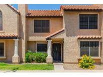 Charming townhome showcasing classic architecture and colorful landscaping at 921 W University Dr # 1191, Mesa, AZ 85201