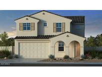 Charming two-story home featuring a two-car garage, neutral stucco and desert landscaping at 17604 W Georgia Ave, Litchfield Park, AZ 85340