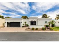 Stunning single-story home with a modern design and well-maintained landscaping at 2737 E Arizona Biltmore Cir # 8, Phoenix, AZ 85016