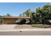 Charming single-story home featuring a well-maintained front yard and attached garage at 3924 E Cortez St, Phoenix, AZ 85028