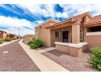 Charming single-story home featuring a cozy porch and well-maintained landscaping, perfect for relaxed living at 420 W Yukon Dr # 8, Phoenix, AZ 85027