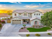 Charming two-story home with a well-manicured front yard and tasteful stone accents at 8500 W Nicolet Ave, Glendale, AZ 85305