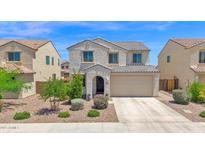 Charming two-story home with landscaped yard and attached two-car garage, perfect for a Gathering at 32347 N Vernal Ln, San Tan Valley, AZ 85144