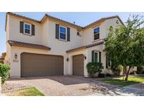 Stunning two-story home with a two-car garage and beautiful brick driveway at 913 W Yosemite Dr, Chandler, AZ 85248