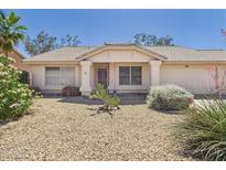 Charming single-story home with well-maintained desert landscaping and neutral color palette at 13431 N 30Th St, Phoenix, AZ 85032