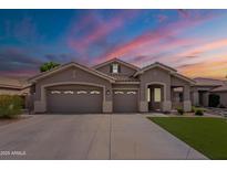 Charming single-story home featuring a three-car garage and well-maintained landscaping at 1635 E Harrison St, Chandler, AZ 85225