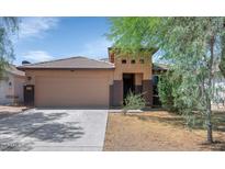 Charming single-story home featuring a tile roof and a two-car garage at 471 W Gascon Rd, San Tan Valley, AZ 85143