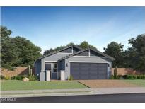 Charming single-story home with a two-car garage and a beautifully landscaped front yard at 23213 W Marguerite Ave, Buckeye, AZ 85326