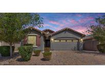 Charming single-Gathering home featuring a well-manicured lawn and a neutral color scheme at 4218 W Palace Station Rd, New River, AZ 85087