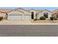 Beautiful single-story home featuring a three-car garage and well-maintained landscaping at 4515 E Casey Ln, Cave Creek, AZ 85331