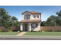 Inviting two-story home with a red tile roof, neutral stucco, manicured lawn, and charming curb appeal at 9739 W Catalina Dr, Phoenix, AZ 85037