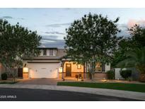 Charming single-Gathering home with manicured lawn, brick accents, and a well-lit, two-car garage at 1529 W State Ave, Phoenix, AZ 85021