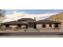Charming single-story home with a modern design and desert landscaping in a mountain setting at 3545 N Vista Way # 404, Buckeye, AZ 85396