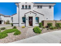 Charming two-story home with a well-manicured front yard and inviting entrance at 651 N Bay Dr, Gilbert, AZ 85233