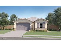 Charming single-story home with a two-car garage and well-maintained landscaping in a Gathering-friendly neighborhood at 17345 W Smoketree Dr, Surprise, AZ 85387