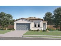 Charming single-story home with a two-car garage and well-manicured lawn at 17348 W Smoketree Dr, Surprise, AZ 85387