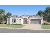 Charming single-story home with a neutral color scheme, a well-manicured lawn, and an attached two-car garage at 17403 W Swayback Pass, Surprise, AZ 85387