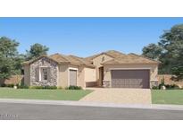 Charming single-story home with stone accents, a two-car garage, and a well-manicured lawn at 17411 W Swayback Pass, Surprise, AZ 85387