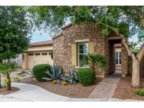 Charming stone home with manicured landscaping and desert landscaping at 4519 N 29Th Way, Phoenix, AZ 85016