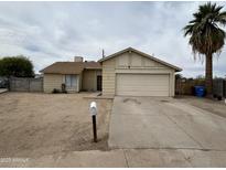 Single-Gathering home featuring a spacious driveway and a well-sized front yard at 6842 S 42Nd Pl, Phoenix, AZ 85042
