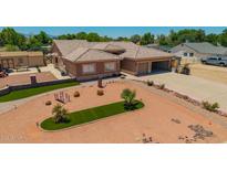 Expansive home featuring meticulous xeriscaping and a spacious two-car garage, enhancing curb appeal at 10535 W San Miguel Ave, Glendale, AZ 85307