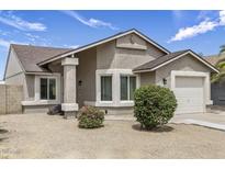 Charming single-story home featuring a low maintenance yard and attached one car garage at 20428 N 32Nd Ln, Phoenix, AZ 85027