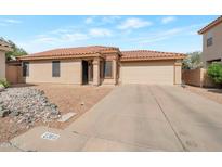 Charming single-story home featuring a well-maintained yard and a spacious two-car garage at 2366 E Spruce Dr, Chandler, AZ 85286