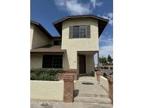 Inviting two-story home with fresh paint, lovely landscaping, and a covered front entry at 170 E Guadalupe Rd # 173, Gilbert, AZ 85234